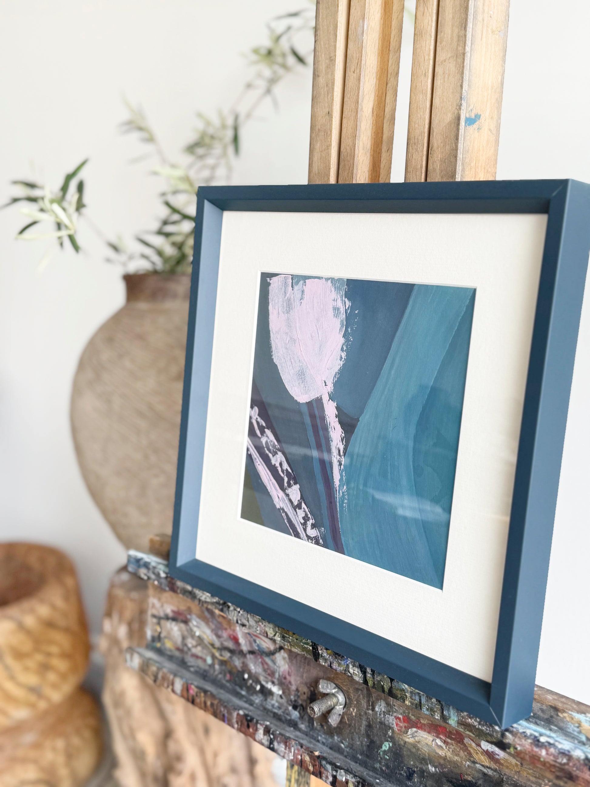 Framed abstract art by Izgan Baz