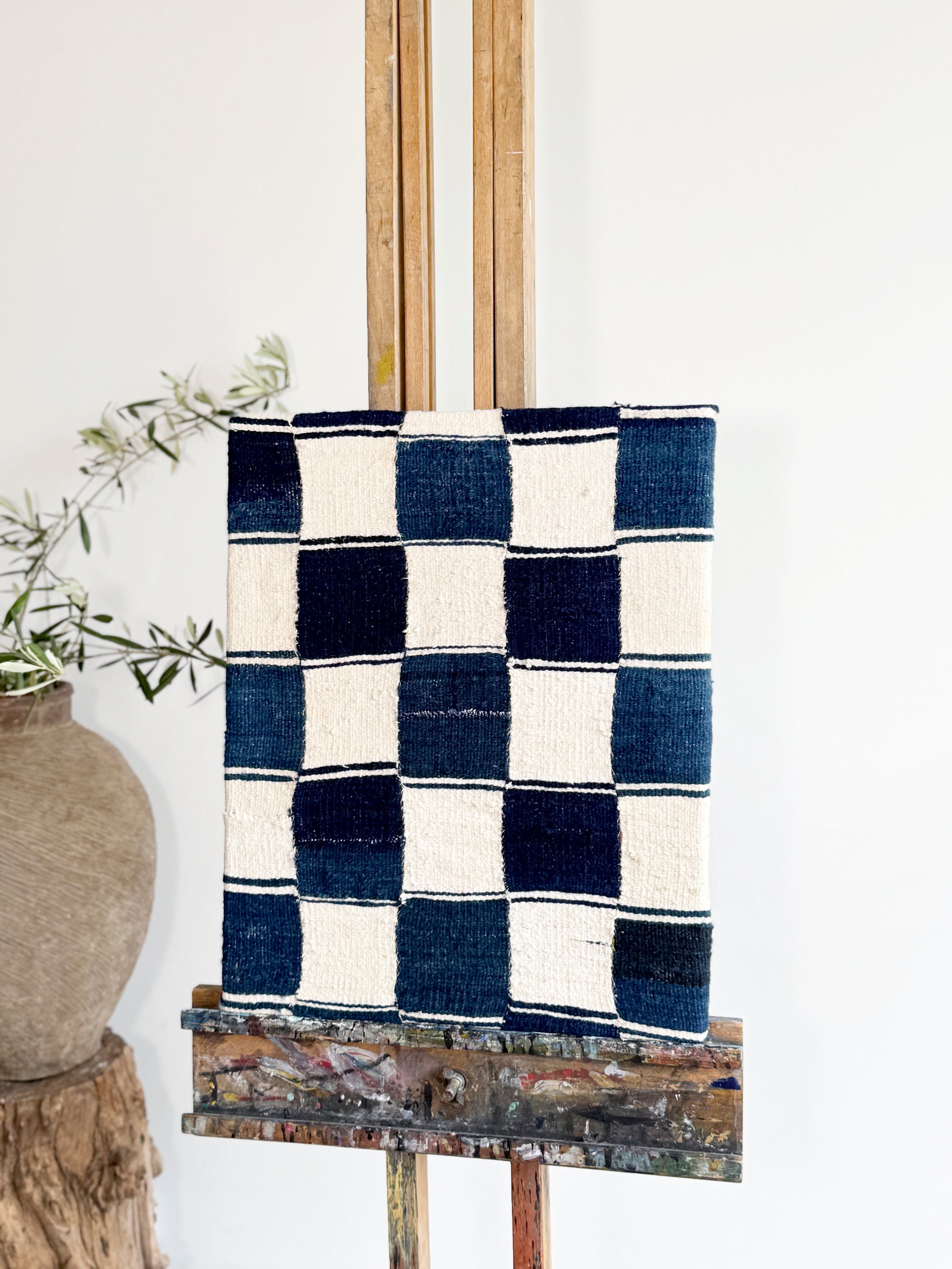 Blue and white checkered ewe fabric on a wooden stand with a white background
antiques London	
homeware shop London
interior styling objects London and Sussex
antique sourcing UK	
curated antiques	
antique homeware / antique homewares	
decorative antiques	
art and objects	
timeless home decor found objects decor
vintage home accessories
antique art	