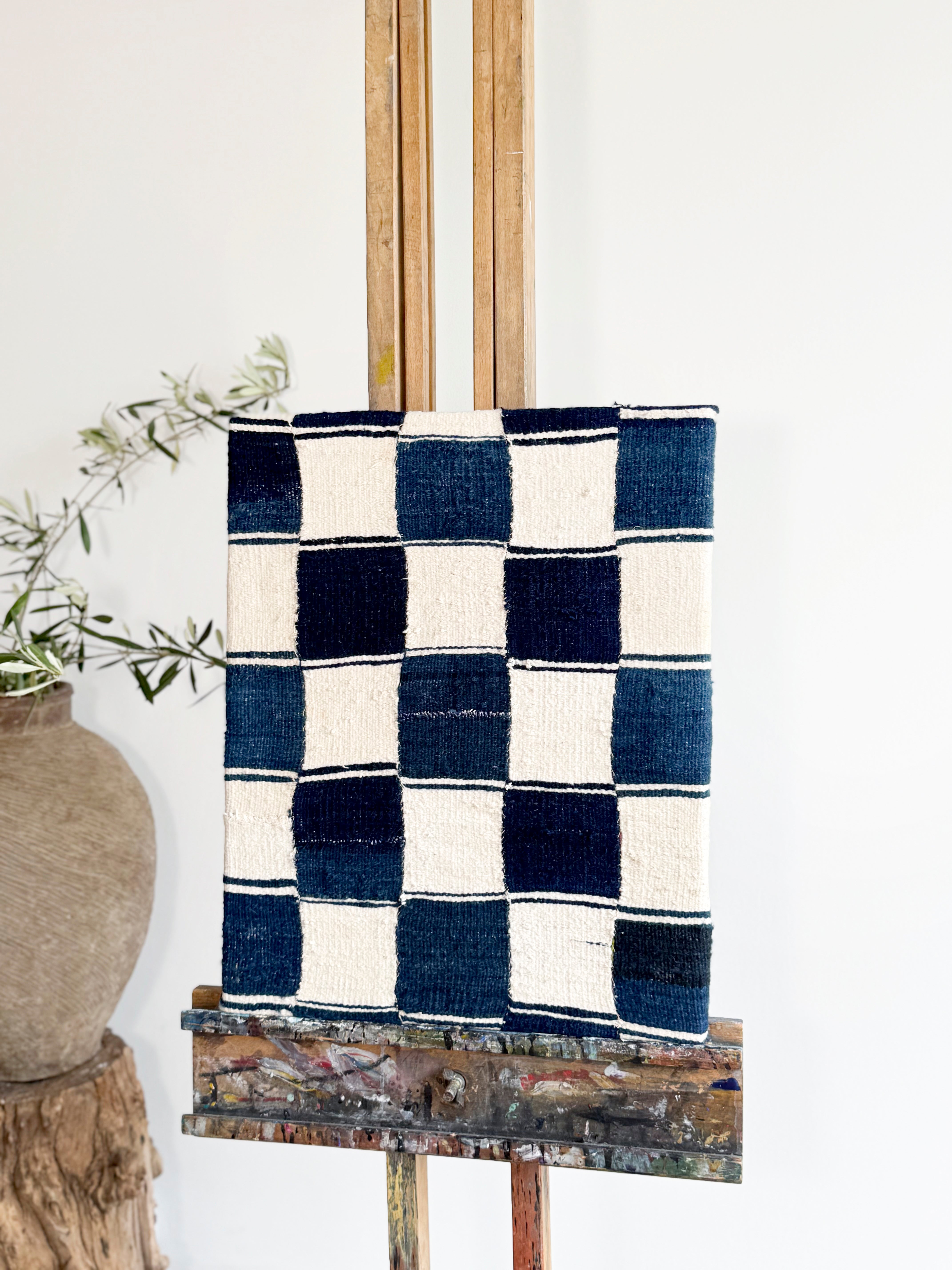 Blue and white checkered ewe fabric on a wooden stand with a white background
antiques London	
homeware shop London
interior styling objects London and Sussex
antique sourcing UK	
curated antiques	
antique homeware / antique homewares	
decorative antiques	
art and objects	
timeless home decor found objects decor
vintage home accessories
antique art	