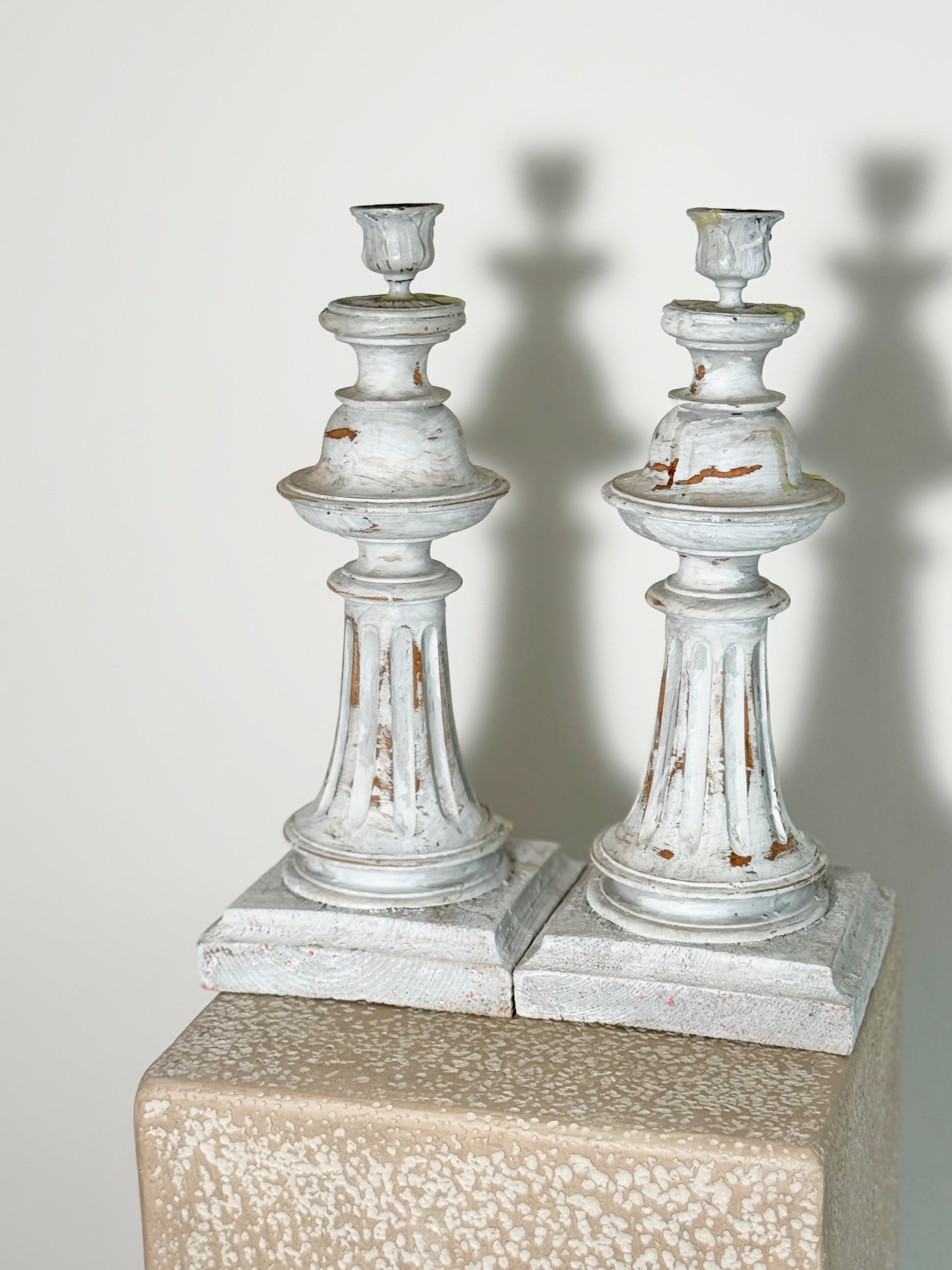French distressed candle sticks featuring an elegant, distressed grey finish, commonly known as the shabby chic