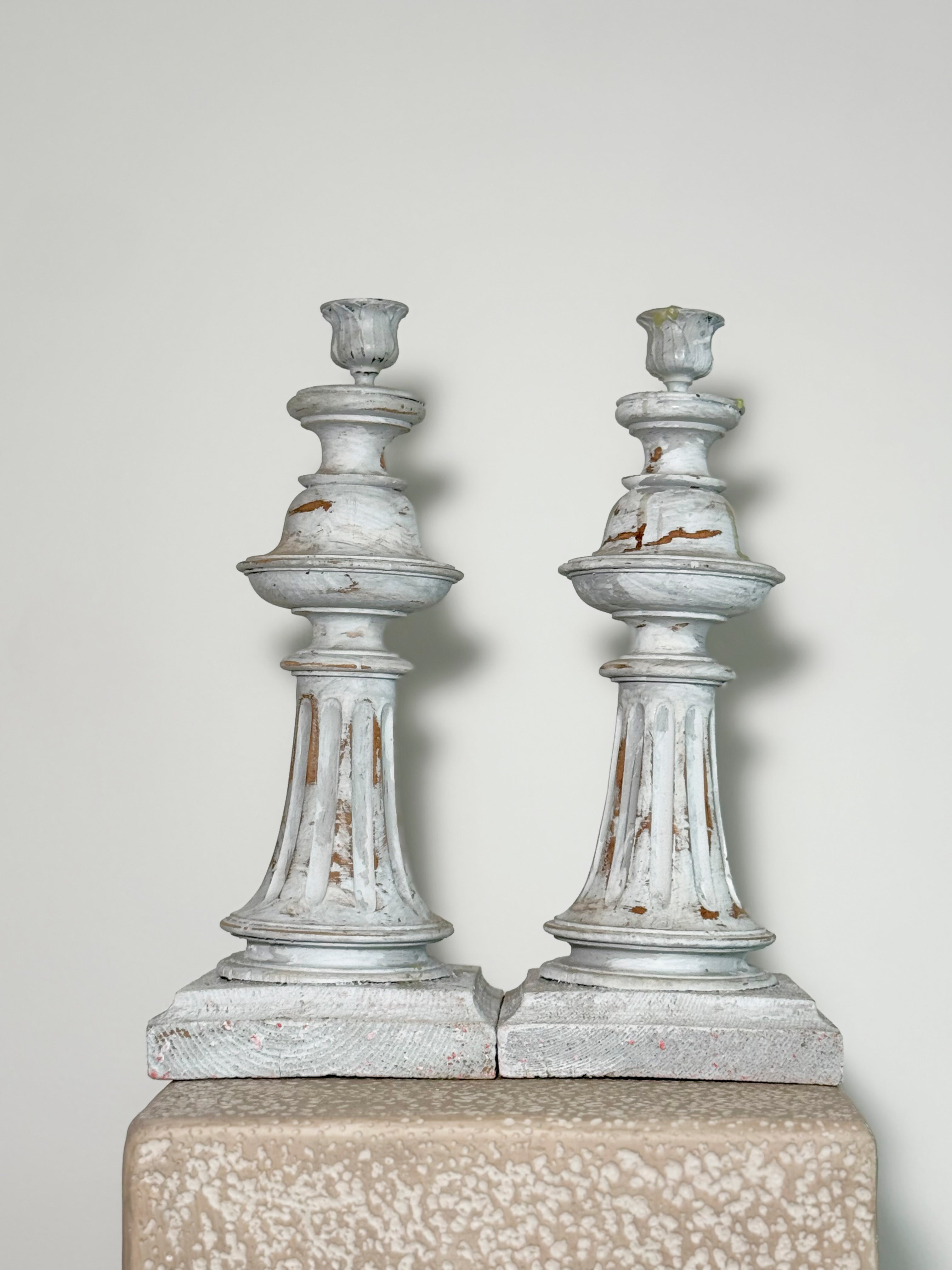 French distressed candle sticks featuring an elegant, distressed grey finish, commonly known as the shabby chic