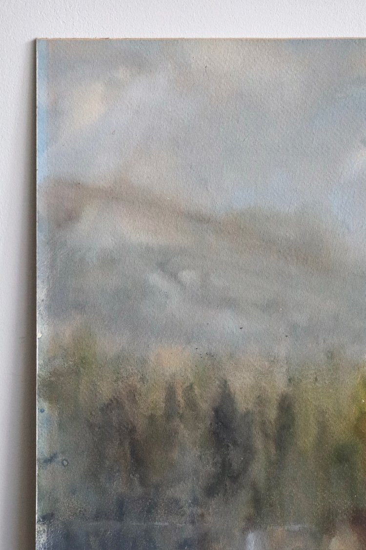 Abstract art with blurred colors and shapes on a textured surface