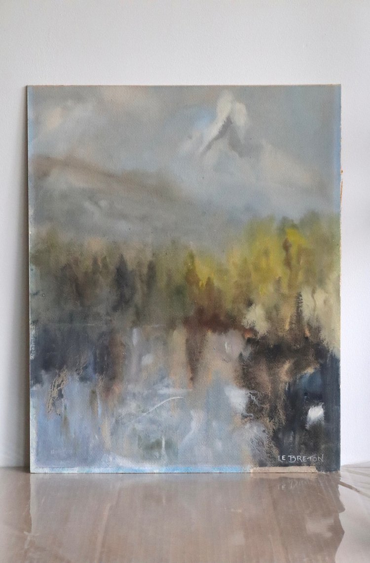 Abstract painting of a landscape with trees and mountains on a white wall.