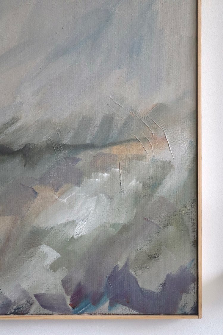 Abstract painting with wavy patterns on a white wall