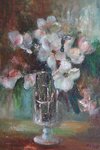 Still life painting of flowers in a glass vase on a wooden surface