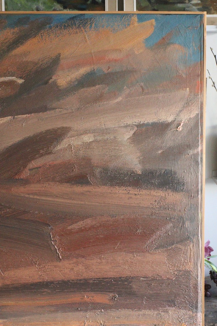 Abstract painting with brown, orange, and blue brush strokes on a wooden panel.