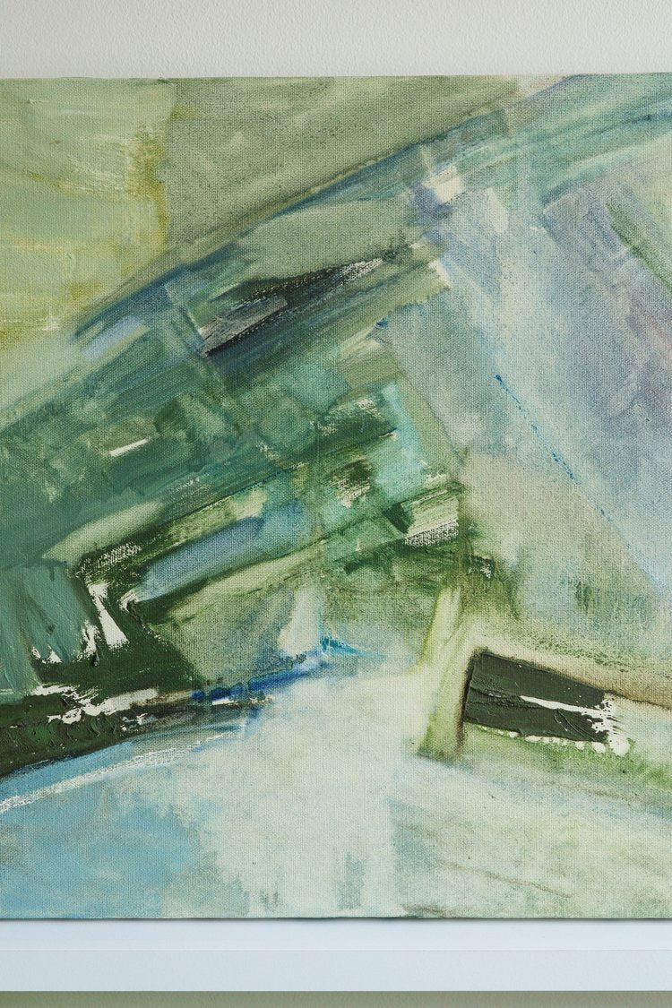 Abstract art piece with green and blue brush strokes on a white background