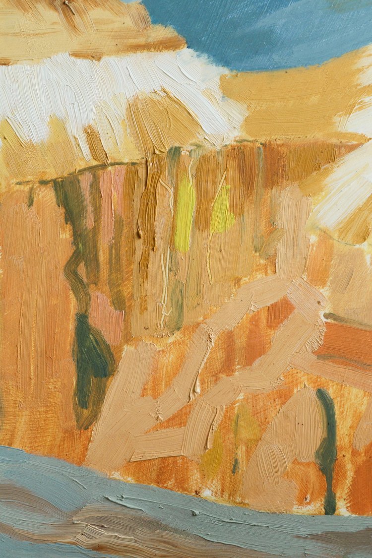 Abstract painting with earthy tones and a blue sky
