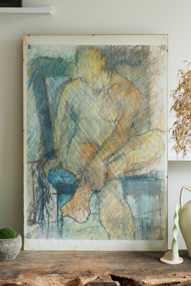 Artistic depiction of a seated figure on a wooden surface with decorative elements.