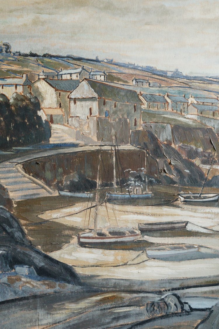 Harbor scene with boats and buildings on a hillside
