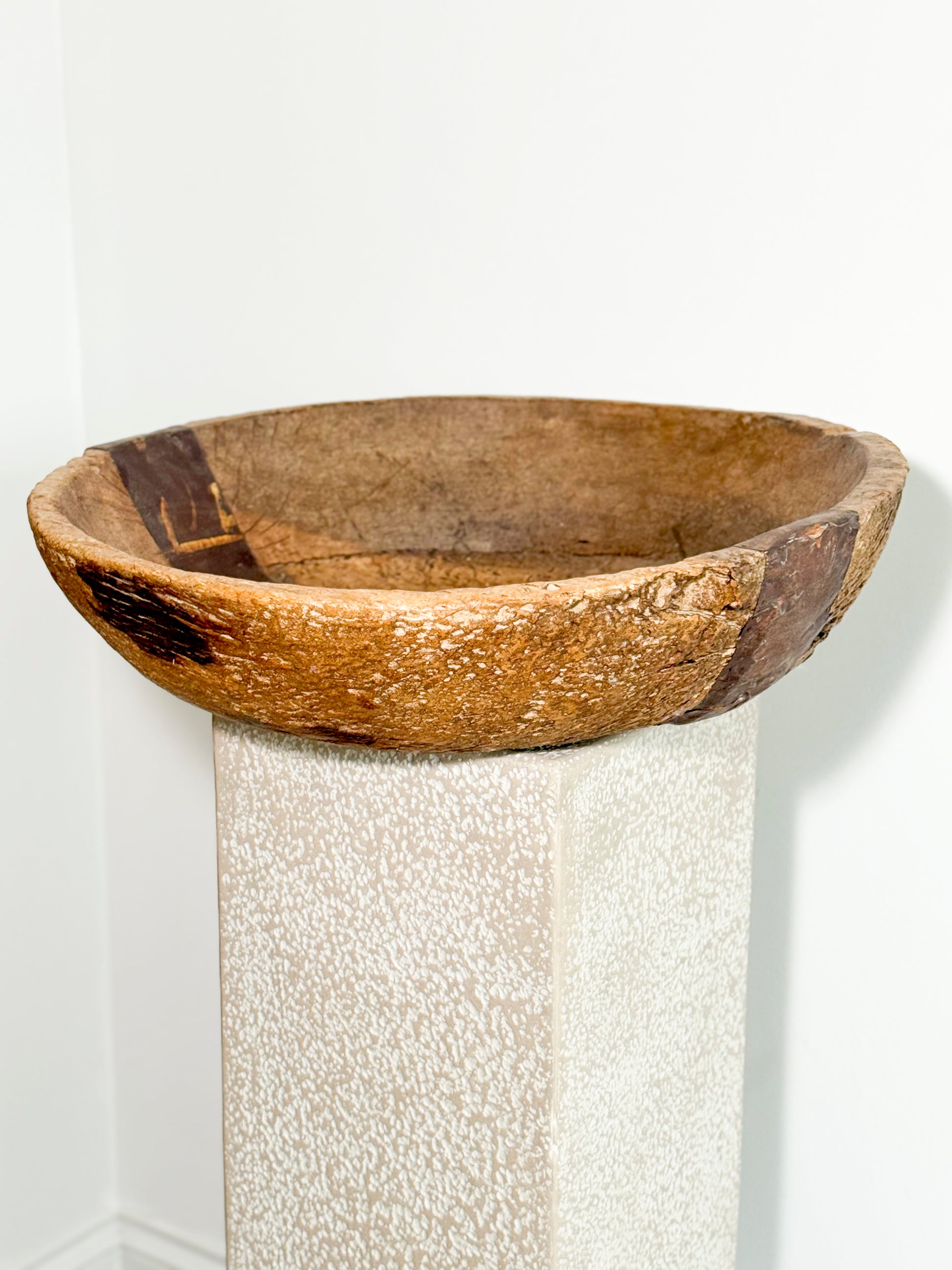 Antique hand-carved wooden bowl