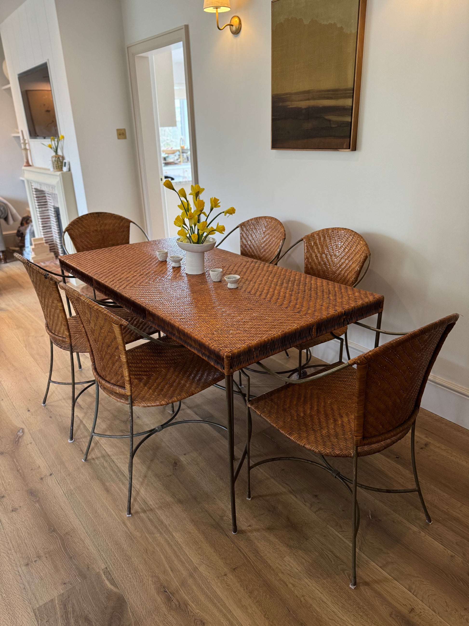 Vintage woven rattan dining table and 6 chairs. A sustainable, characterful alternative to new furniture for timeless interiors.
