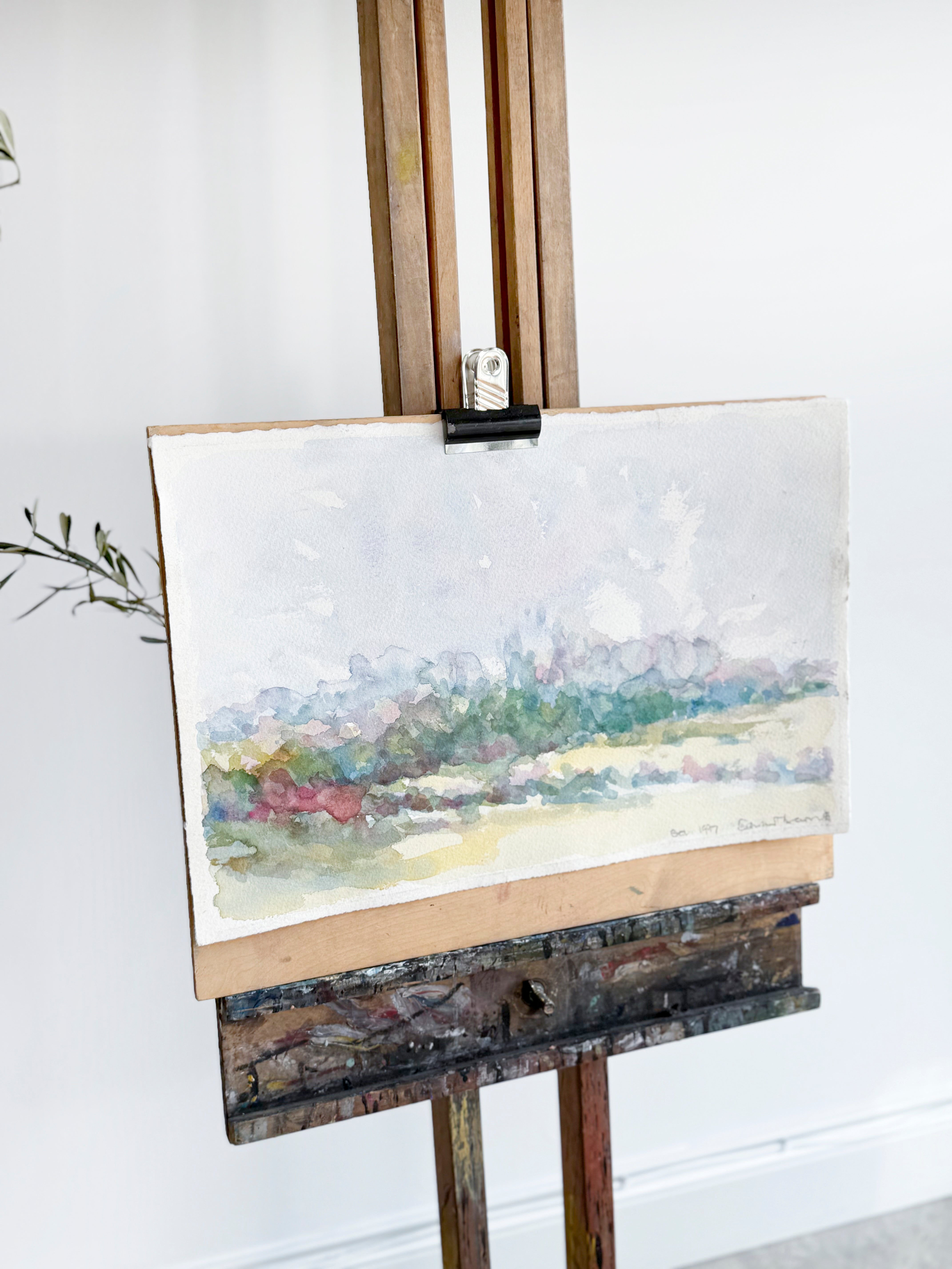 Painting of a landscape on an easel against a white wall
antiques London	
homeware shop London
interior styling objects London and Sussex
antique sourcing UK	
curated antiques	
antique homeware / antique homewares	
decorative antiques	
art and objects	
timeless home decor found objects decor
vintage home accessories
antique art	